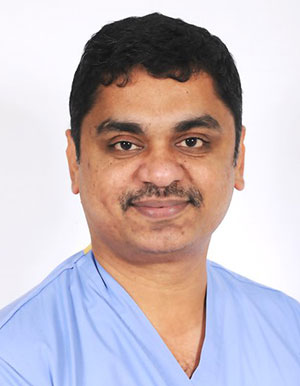 Therapist with patient on fitness ball